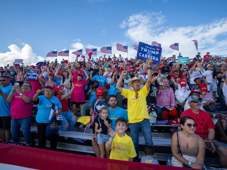 Rally goers, 45th President Donald Trump and Marco Rubio are seen at the Save America Rally at the Miami Dade County Fair and Expo in Miami on Sunday November 6, 2022.