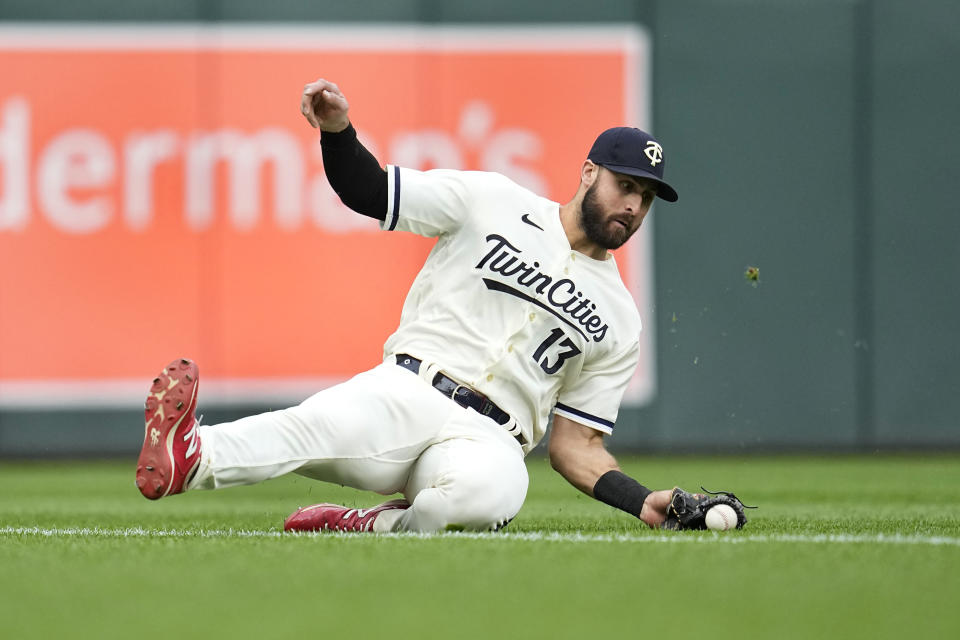 Minnesota Twins left fielder Joey Gallo makes a catch for the out on San Diego Padres' Manny Machado during the first inning of a baseball game Wednesday, May 10, 2023, in Minneapolis. (AP Photo/Abbie Parr)