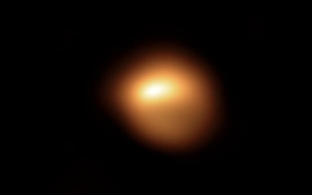 The red supergiant star Betelgeuse, in the constellation of Orion, dimmed by roughly 25 per cent from November 2019 to March 2020. This image of the star’s surface, taken with the SPHERE instrument on ESO’s Very Large Telescope in late 2019, is among the first observations to come out of a campaign aimed at understanding why the star dimmed.  (ESO/M. Montargès et al - image credit)
