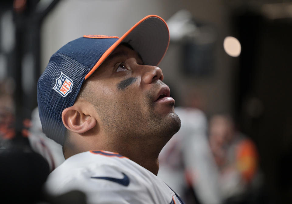 LAS VEGAS, NEVADA - JANUARY 7: Denver Broncos quarterback Russell Wilson (3) looks up at a fan as he leaves after the game at Allegiant Stadium in Las Vegas, Nevada on January 7, 2024. The Las Vegas Raiders beat the Denver Broncos 27-14 during week 18 of NFL season. (Photo by  RJ Sangosti/MediaNews Group/The Denver Post via Getty Images)