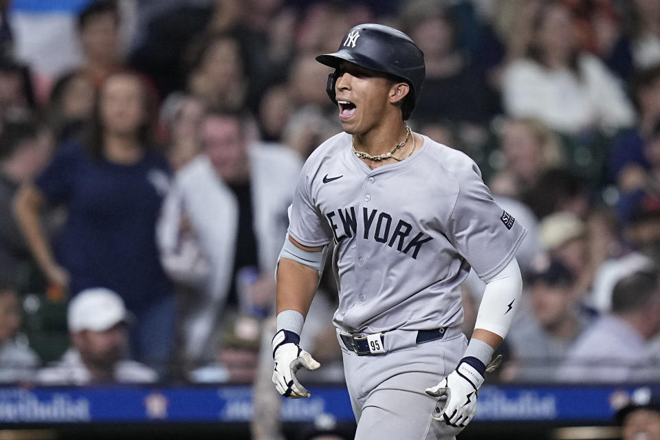 New York Yankees' Oswaldo Cabrera runs the bases after hitting a two-run home run against the Houston Astros during the seventh inning of a baseball game Saturday, March 30, 2024, in Houston. (AP Photo/Kevin M. Cox)
