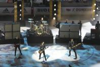 Green Day performs between NHL hockey All Star games Saturday, Jan. 25, 2020, in St. Louis. (AP Photo/Scott Kane)