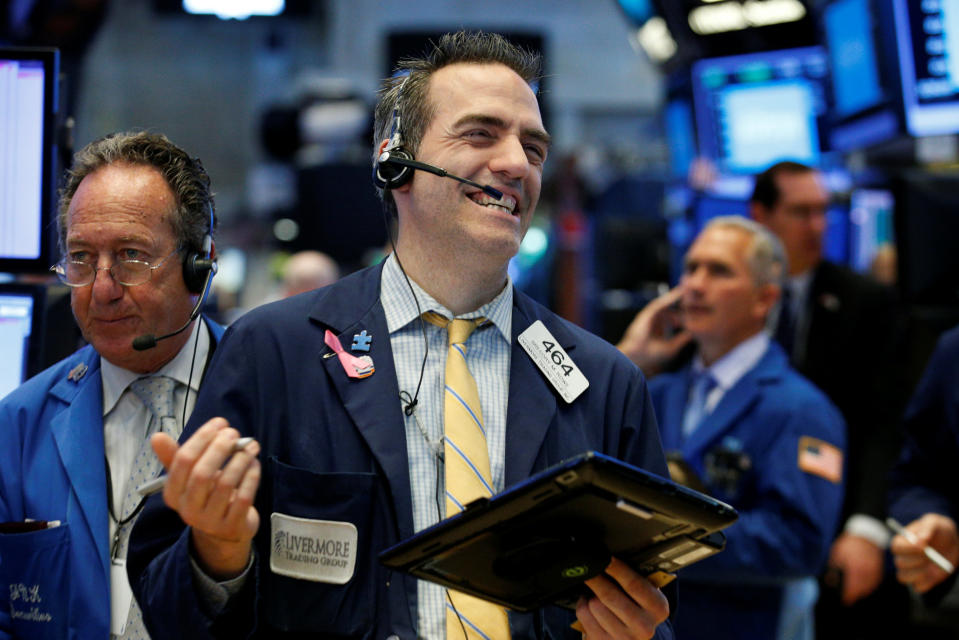 Traders work on the floor of the New York Stock Exchange (NYSE) in New York, U.S., July 12, 2017. REUTERS/Brendan McDermid