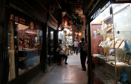 Vendors wait for customers in a popular tourist area named "Khan el-Khalili" at al-Hussein and Al-Azhar districts in old Islamic Cairo, Egypt August 18, 2016. Picture taken August 18, 2016. REUTERS/Amr Abdallah Dalsh