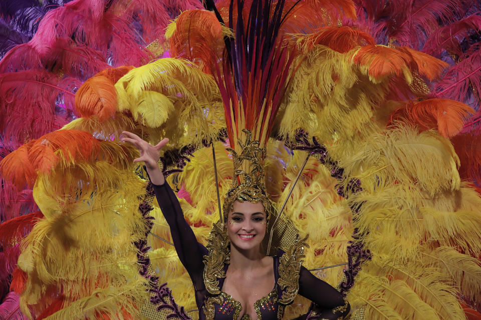 A performer takes part in a night parade to celebrate Chinese New Year in Hong Kong, Saturday, Jan. 28, 2017. The Lunar New Year this year marks the Year of the Rooster in the Chinese calendar. (AP Photo/Vincent Yu)