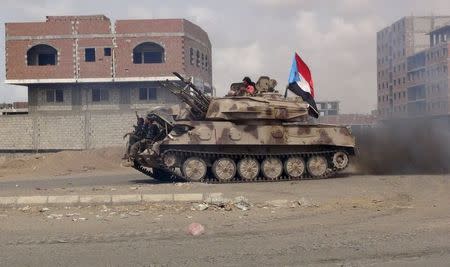 Anti-Houthi fighters of the Southern Popular Resistance ride a military vehicle in Yemen's southern port city of Aden May 28, 2015. REUTERS/Stringer