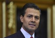 Mexican President Enrique Pena Nieto delivers an address in central London on March 3, 2015