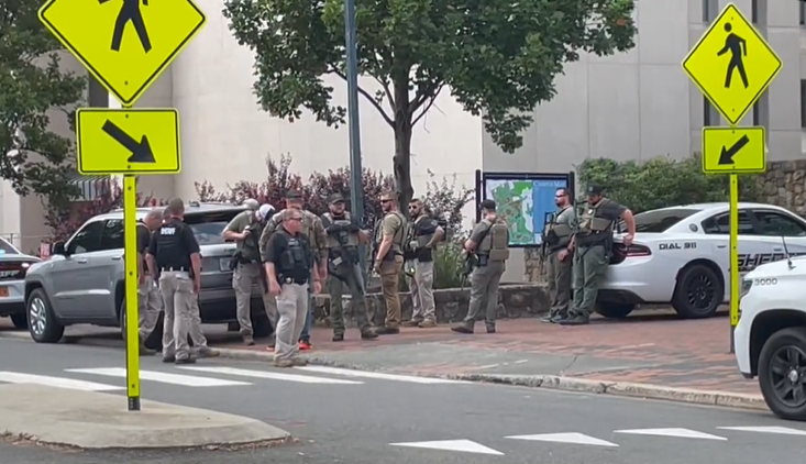 Law enforcement officers patrol UNC-Chapel Hill’s campus after an emergency alert went out concerning an armed individual on the school’s campus. (Ben Bokun/CBS 17)
