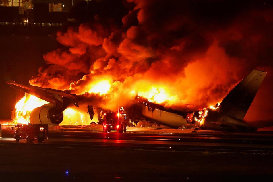 Japan Airlines' A350 airplane is on fire at Haneda international airport in Tokyo (Reuters)