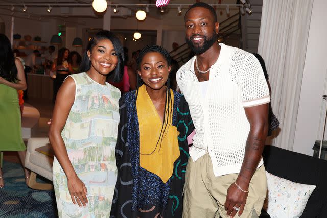 <p>Jerritt Clark/Getty</p> Gabrielle Union and Dwyane Wade with dermatologist, Dr. Naana Boakye