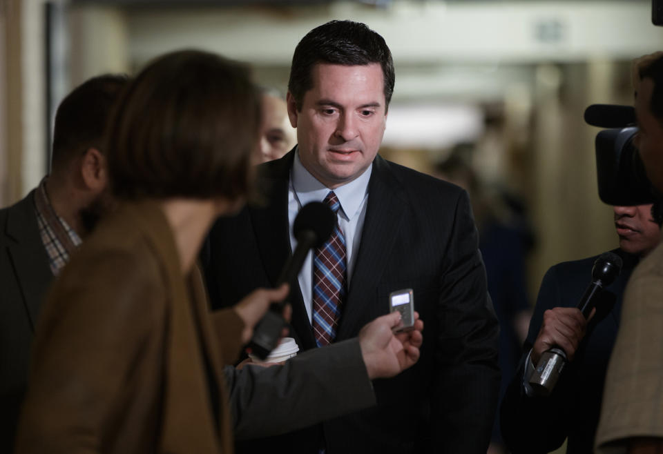 House Intelligence Committee Chairman Rep. Devin Nunes, R-Calif. is pursued by reporters as he arrives for a weekly meeting of the Republican Conference with House Speaker Paul Ryan and the GOP leadership, Tuesday, March 28, 2017, on Capitol Hill in Washington. Nunes is facing growing calls to step away from the panel's Russia investigation as revelations about a secret source meeting on White House grounds raised questions about his and the panel's independence. (AP Photo/J. Scott Applewhite)