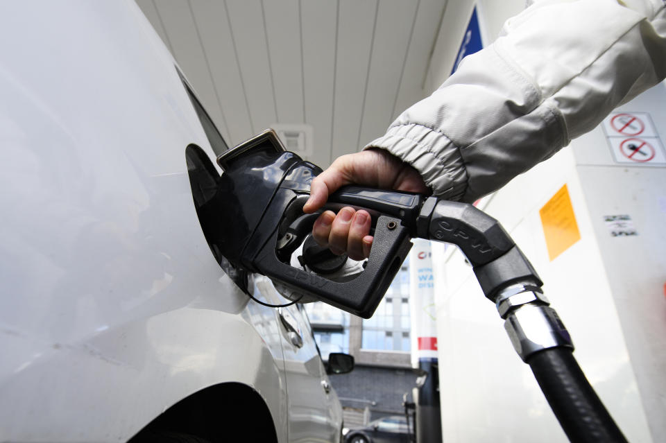 Canadian families will get between $760 and $2,160 in carbon price rebates this year as the carbon price itself gets hiked another $15 per tonne. A person pumps gas at a gas station in Mississauga, Ont.,  Tuesday, February 13, 2024. THE CANADIAN PRESS/Christopher Katsarov