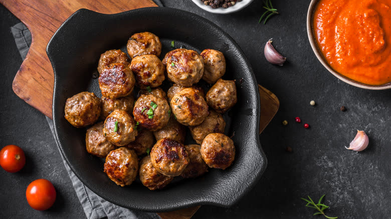 homemade meatballs in black pan