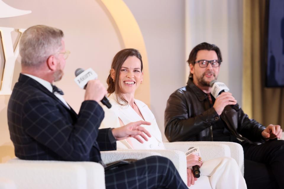 Marc Malkin, Senior Culture & Events Editor at Variety, Hilary Swank, and Jon Gunn speak onstage during the Variety Spirituality and Faith in Entertainment Breakfast presented by FAMI at The London Hotel on Tuesday, Feb. 13, 2024 in Los Angeles, California. | Rodin Eckenroth, Variety via Getty Images