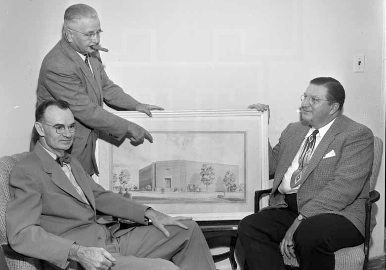 Texas Tech architecture professor and Society charter member F. A. Kleinschmidt (right) drafted the plans for a museum building shown to Holden (left).  This marked the first time a major building on campus had not been developed in the Spanish Renaissance style originated by Wyatt Hedrick.