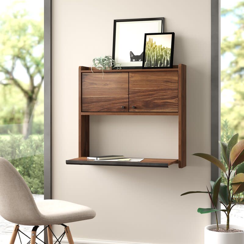 <p><a href="https://go.redirectingat.com?id=74968X1596630&url=https%3A%2F%2Fwww.wayfair.com%2F--%2Fpdp%2Funion-rustic--jolita-floating-desk-x117222128-l32-w006111017.html&sref=https%3A%2F%2Fwww.goodhousekeeping.com%2Fhome-products%2Fg46629286%2Ffloating-wall-mounted-desks%2F" rel="nofollow noopener" target="_blank" data-ylk="slk:Shop Now;elm:context_link;itc:0;sec:content-canvas" class="link ">Shop Now</a></p><p>Jolita Floating Desk</p><p>wayfair.com</p><p>$163.99</p>