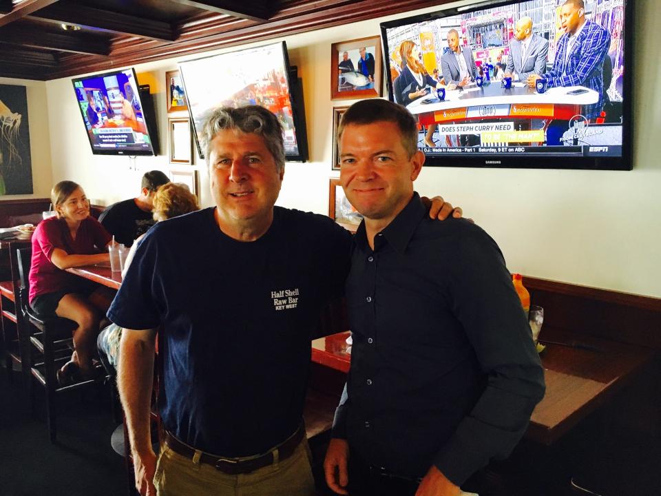 College football coach Mike Leach, left, and USA TODAY Sports reporter Brent Schrotenboer.