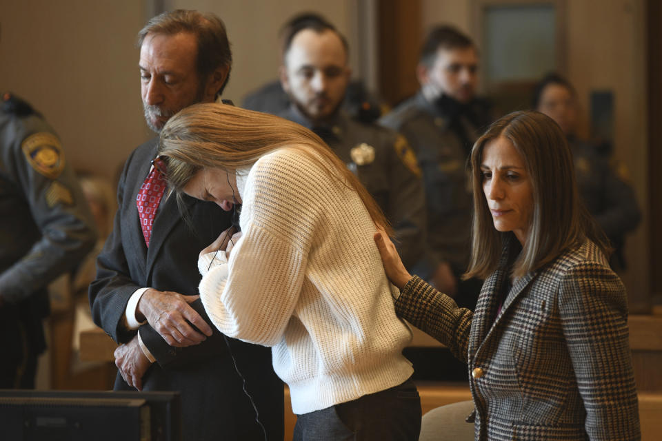 Michelle Troconis listens as a verdict of guilty on all counts is read on the final day jury deliberation for her criminal trial at Connecticut Superior Court in Stamford, Conn. Friday, March 1, 2024. Troconis was found guilty by the jury following a lengthy trial in which prosecutors laid out a case that she helped her then-boyfriend, Fotis Dolus, plot and cover up the killing of his estranged wife, Jennifer Dulos, as they battled each other in divorce and child custody proceedings. (Ned Gerard/Hearst Connecticut Media via AP, Pool)