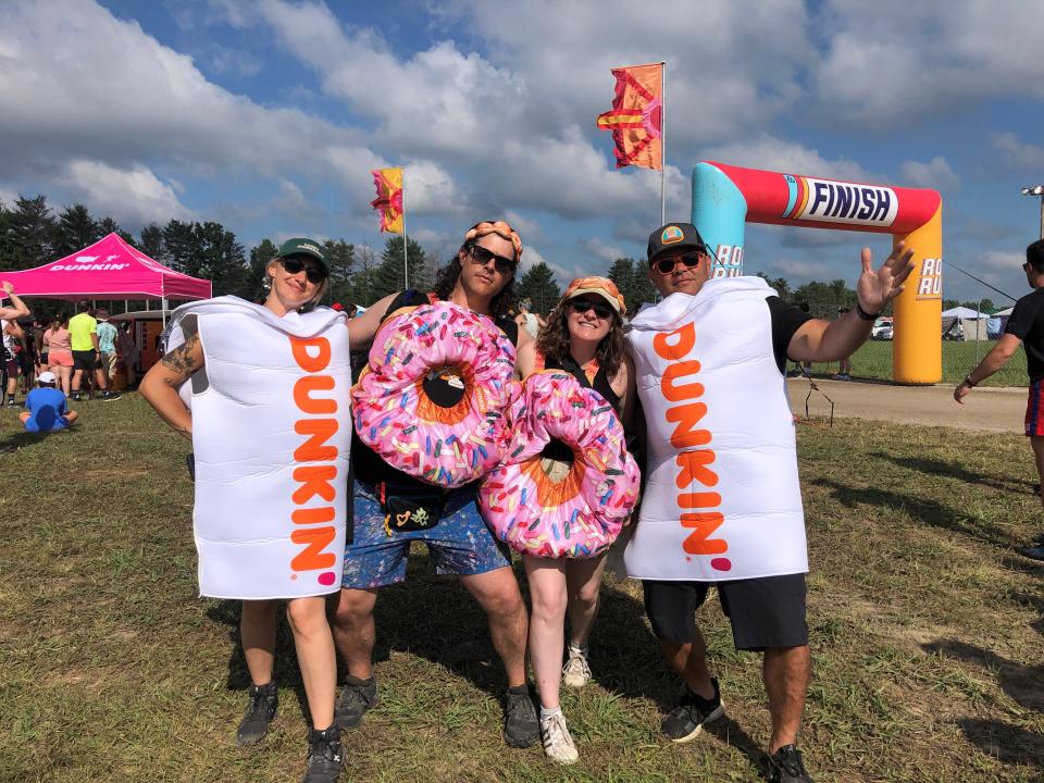 These four dressed up like Dunkin' Donuts coffee and donuts for the Eighth First Annual Roo Run 5K.