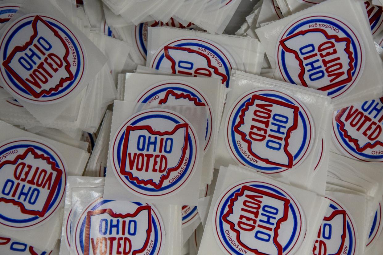 A bin of voting stickers awaits people who cast their ballots.