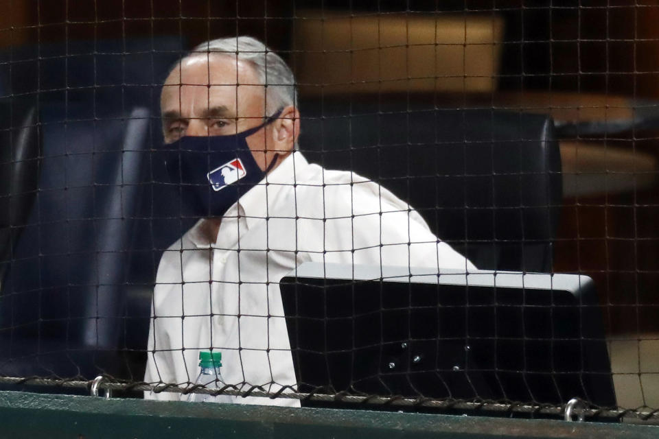 MLB commissioner Rob Manfred hopes expanded postseason and extra-inning rules will stick around. (Photo by Ronald Martinez/Getty Images)