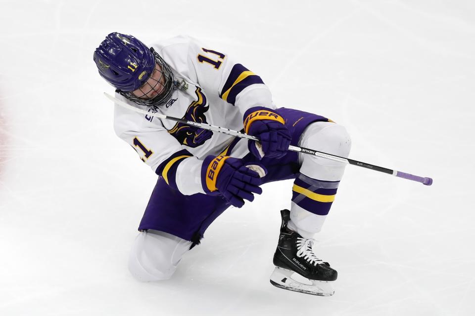 Minnesota State's Benton Maass celebrates after scoring during the second period of the team's NCAA men's Frozen Four hockey semifinal against Minnesota, Thursday, April 7, 2022, in Boston. (AP Photo/Michael Dwyer)