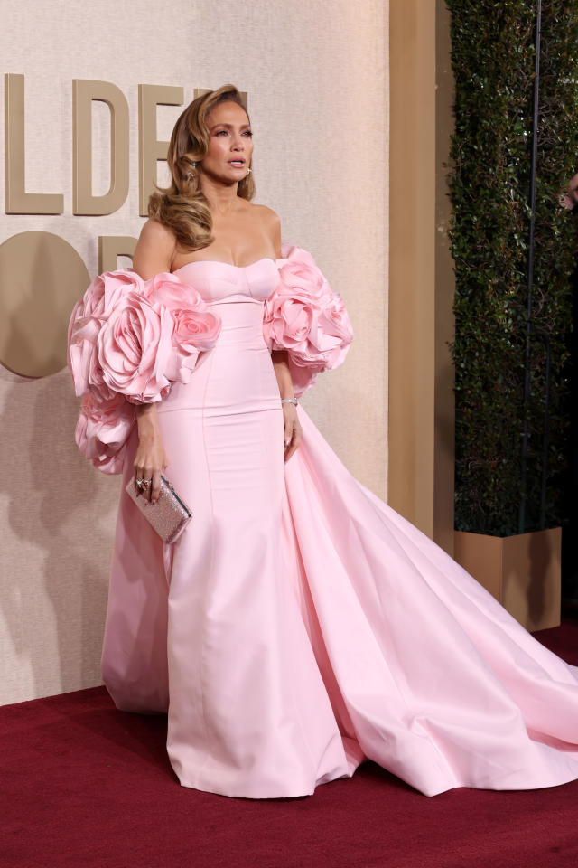 Jennifer Lopez Paired a Lacy, Barbiecore-Approved Bra With Nothing But a  Silky Pink Robe