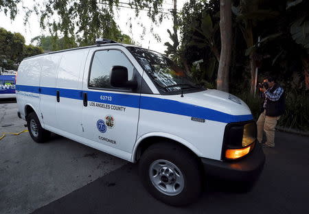 The Los Angeles County Coroner van arrives at the house of Andrew Getty, 47, in the Hollywood Hills section of Los Angeles, California March 31, 2015. REUTERS/Kevork Djansezian