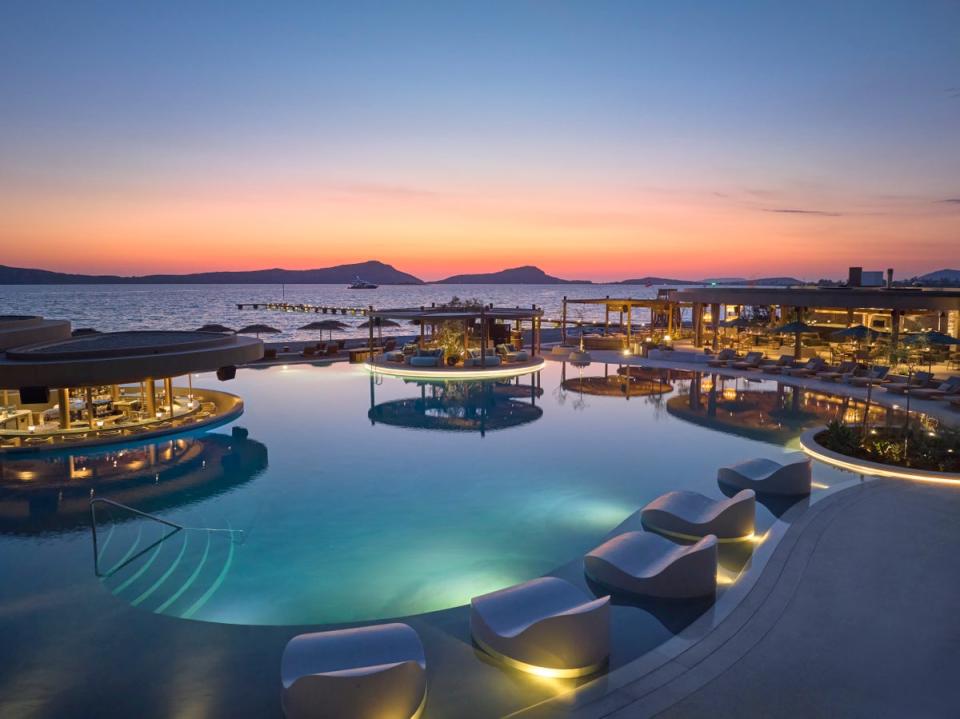 Slip into the serene pool at the Ormos Beach Club (MO)