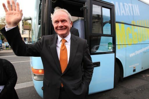 Sinn Fein presidential candidate Martin McGuinness canvasses in Dublin in October 2011. Queen Elizabeth II made a historic gesture in Northern Ireland's peace process when she shook hands with McGuinness -- a former IRA commander