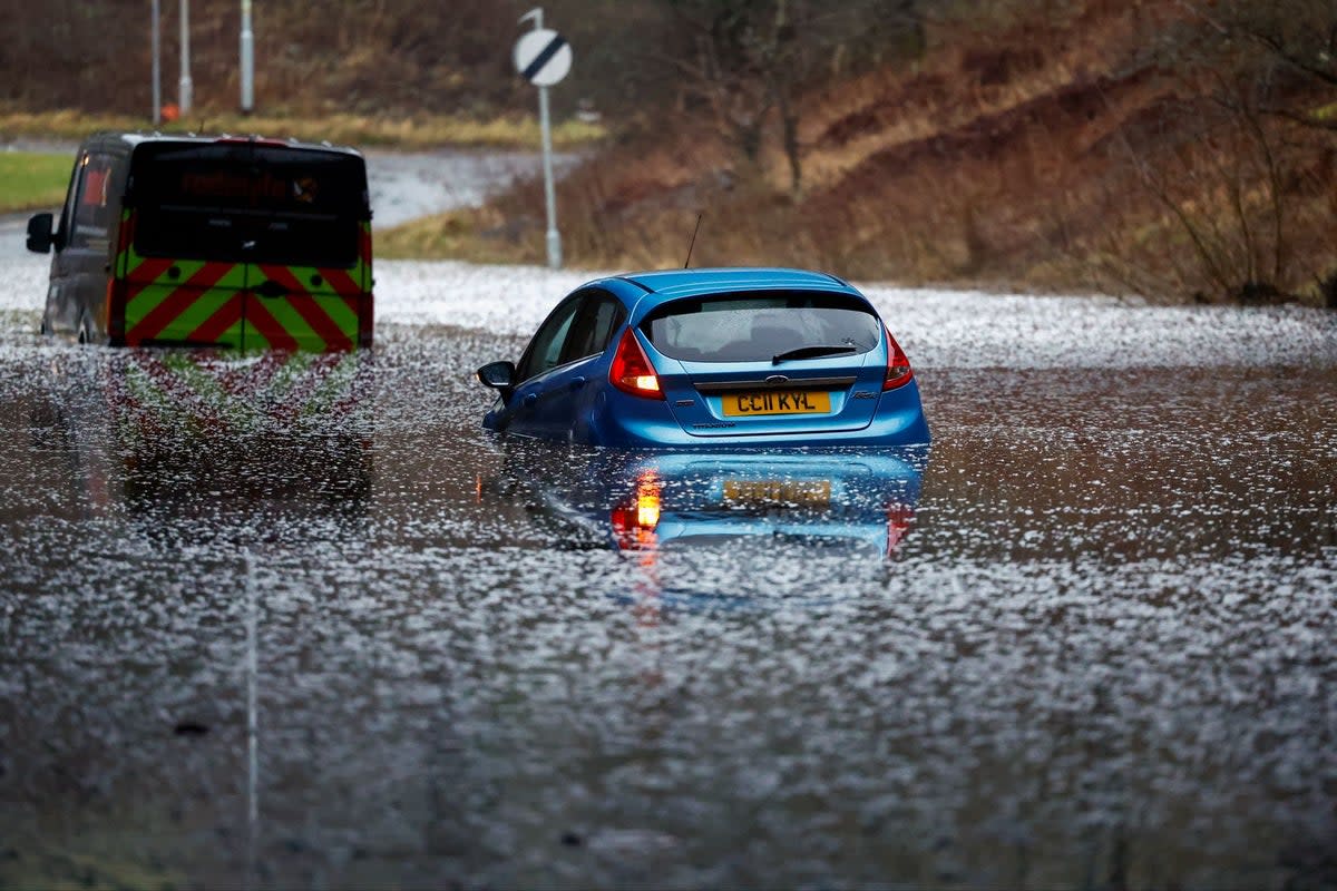 Cars stuck in flood water in Old Kilpatrick, Scotland (Getty Images)