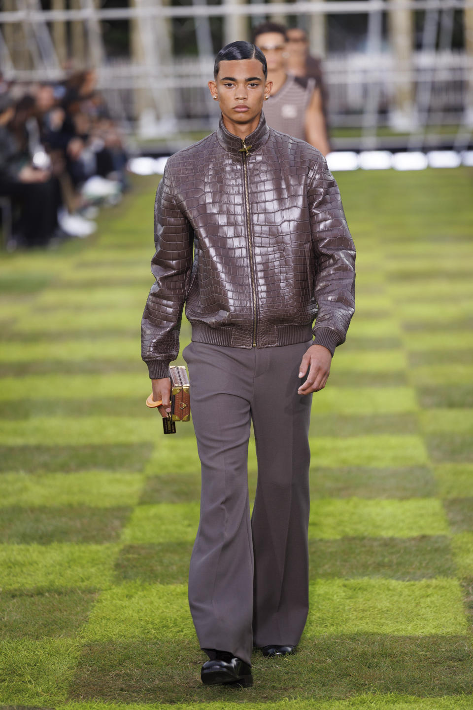 A model wears a creation as part of the Louis Vuitton Spring Summer 2025 collection, that was presented in Paris, Tuesday, June 18, 2024. (Photo by Vianney Le Caer/Invision/AP)