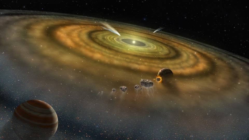 An artist's rendering of a planet forming from a disk of material around a star.