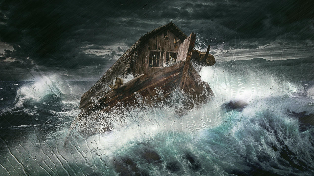  An illustration of Noah's ark during the biblical flood. We see a wood boat crashing over a giant wave against a stormy sky. 