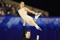 Kirsten Moore-Towers and Michael Marinaro of Canada perform in the pairs free skating program during the ISU Grand Prix of Figure Skating in Sapporo, northern Japan, Saturday, Nov. 23, 2019. (AP Photo/Toru Hanai)