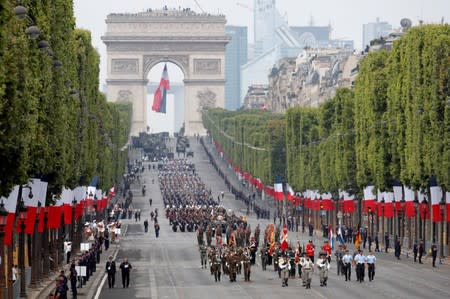 The traditional Bastille Day military parade on the Champs-Elysees Avenue in Paris