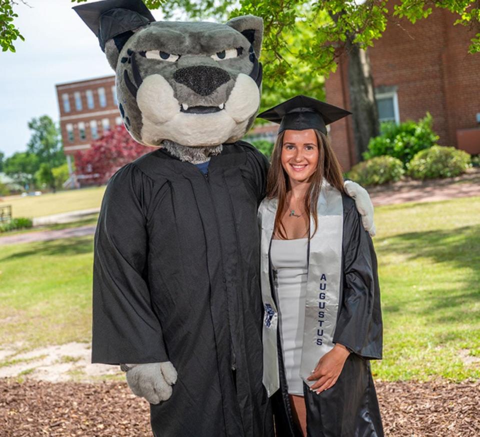 Maddy Frediani will graduate from the College of Education and Human Development with a degree in kinesiology with a concentration in health science. During her time at AU, she also became a handler for mascot, Augustus.