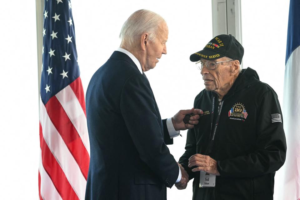 President Joe Biden speaks with World War II veteran Sydney 