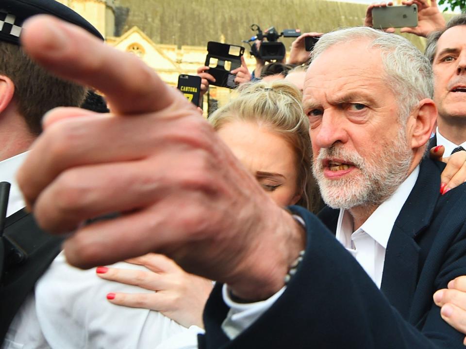 Labour leader Jeremy Corbyn arrives to speak in Parliament Square, where the Momentum campaign group are holding a