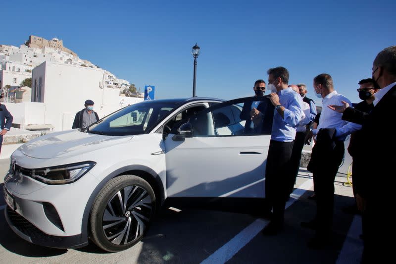 Greek PM Mitsotakis and Volkswagen AG CEO Herbert Diess attend a delivery ceremony of electric cars in the island of Astypalea