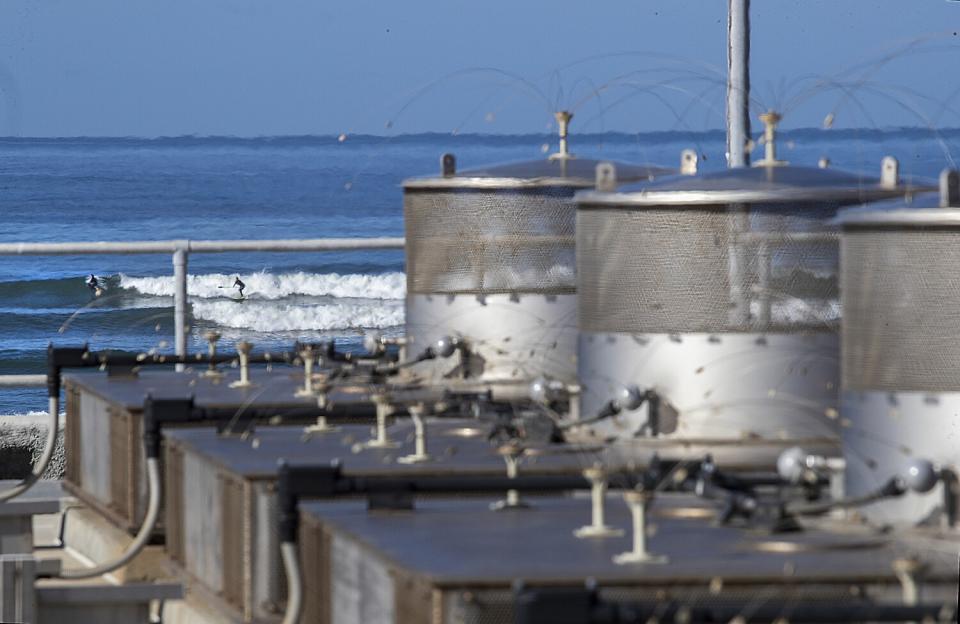 Nuclear waste canisters near the Pacific shoreline at San Onofre Nuclear Generating Station.