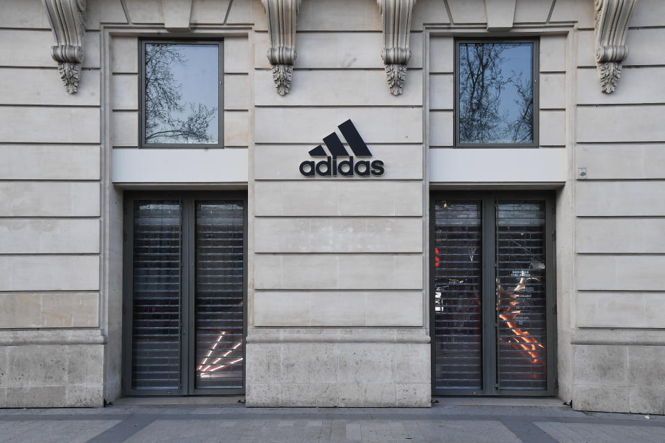 PARIS, FRANCE - MARCH 30: View of closed Adidas store on the Champs Elysees during the Coronavirus epidemic on March 30, 2020 in Paris, France. The country is fining people caught in violation of its national lockdown measures to stop the spread of COVID-19. The pandemic has spread to at least 182 countries, killing more than 37,000 and infecting hundreds of thousands more. (Photo by Stephane Cardinale - Corbis/Corbis via Getty Images)