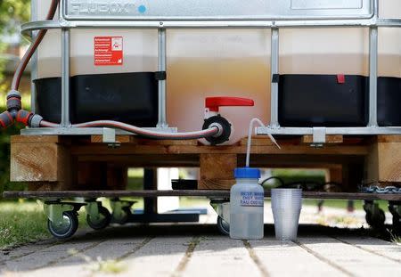 A tank with some 200 liters of urine is seen as part of a machine that turns urine into drinkable water and fertilizer using solar energy, at the University of Ghent, Belgium, July 26, 2016. REUTERS/Francois Lenoir