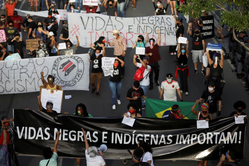 People attend an anti-racism demonstration named "Black and Indigenous Lives Matter" in Manaus