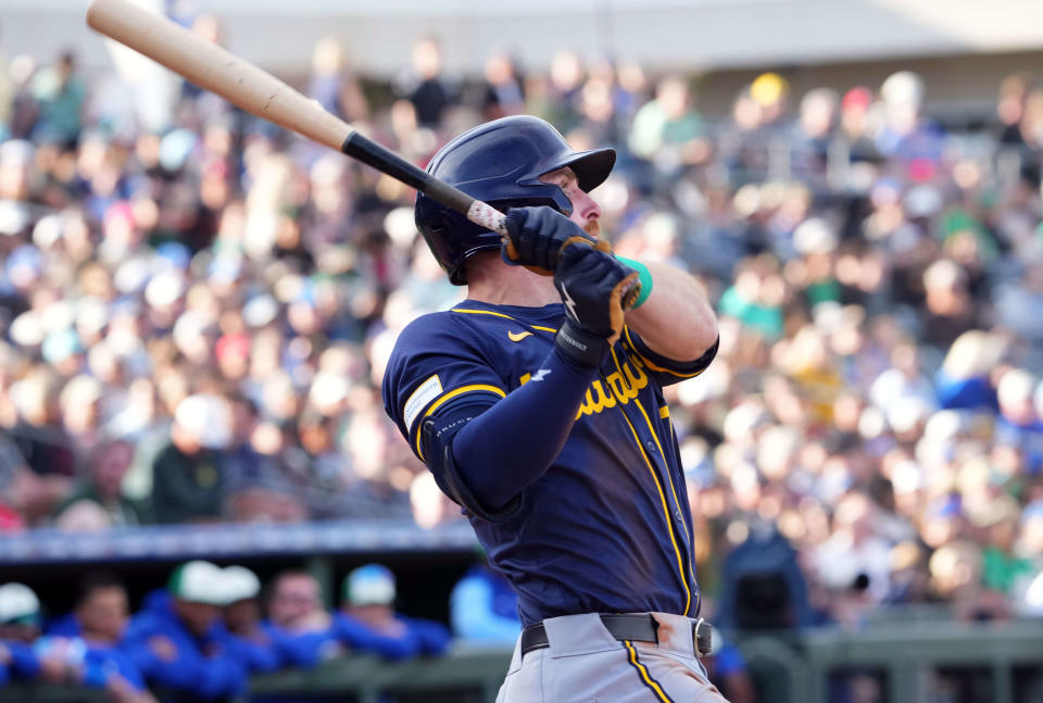 Brewers second baseman Oliver Dunn bats against the Royals during a spring training game at Surprise Stadium in Surprise, Arizona, on March 17.