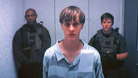 Dylann Storm Roof appears by closed-circuit television at his bond hearing in Charleston, South Carolina June 19, 2015 in a still image from video. REUTERS/POOL