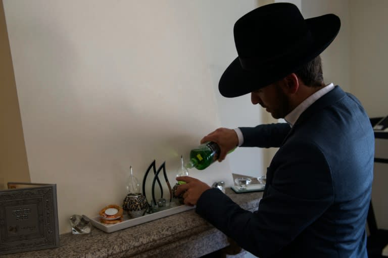 A member of the Jewish community of Porto prepares his home for Shabbat festive day in Porto, on September 2, 2016
