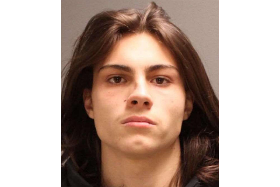 This booking photo provided by the Philadelphia Police Department shows Miles Pfeffer. Pfeffer will face charges of murder, murder of a law enforcement officer, robbery, carjacking and weapons crimes in the death of Temple University Police Officer Christopher Fitzgerald, who prosecutors said was shot in the head while responding to an incident near campus. He also faces a slew of charges in the subsequent carjacking. (Philadelphia Police Department via AP)