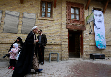 Iranian pilgrims are seen outside the former home of the late Ayatollah Ruhollah Khomeini, in Najaf, Iraq February 10, 2019. Picture taken February 10, 2019. REUTERS/Alaa al-Marjani