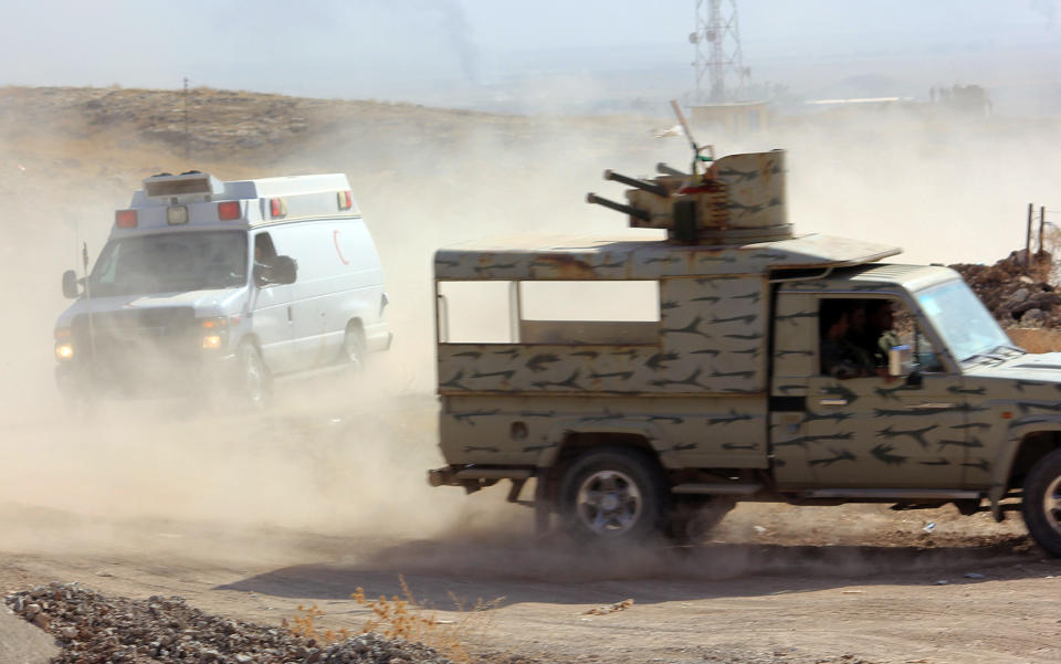 Fighting in a village in the Narwan area on the NE side of Mosul. (Photo: Ash Gallagher for Yahoo News)